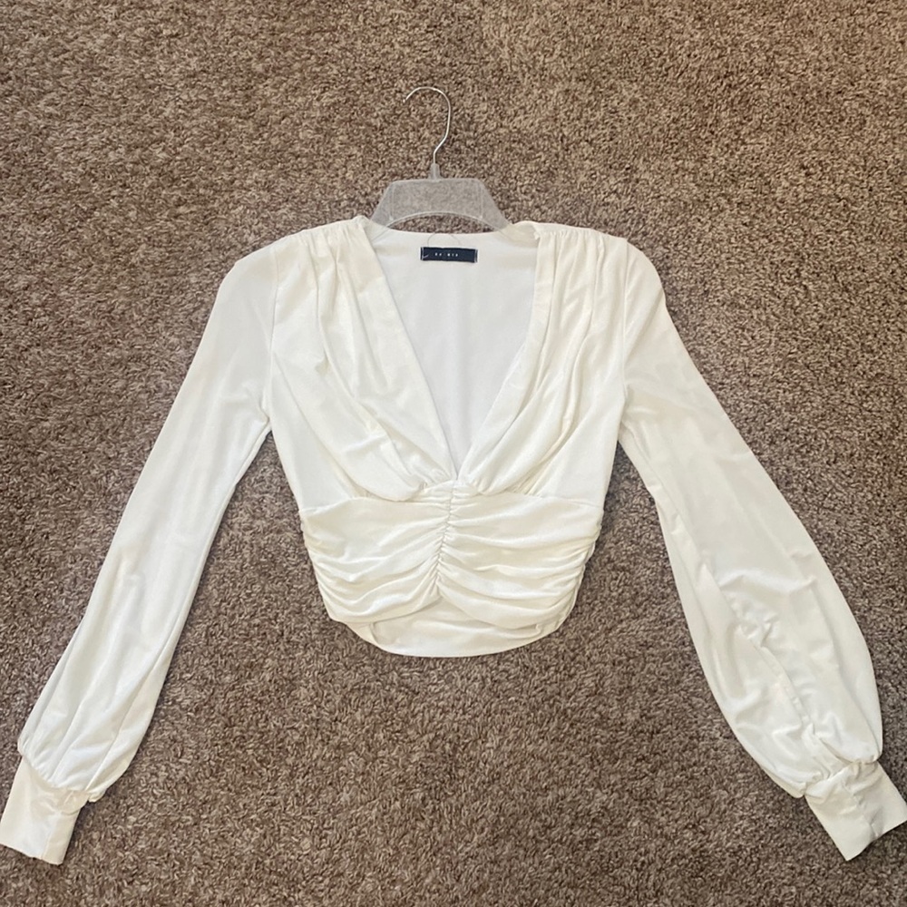 cream saints long sleeve deep v crop top